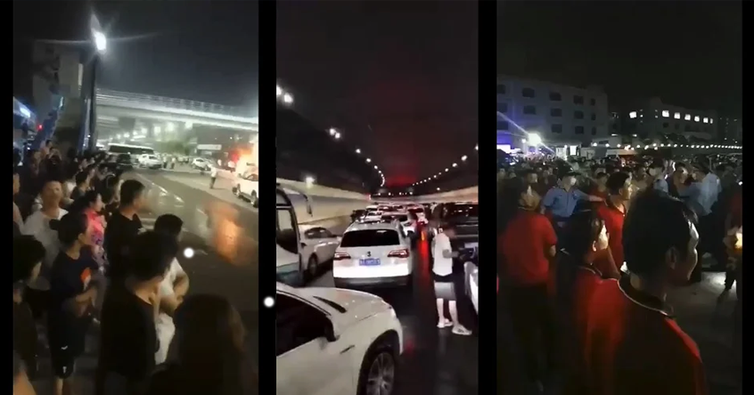 Gia đình của hơn một nghìn người mất tích ở Trịnh Châu đứng trên đường phố vào ban đêm để chứng kiến ​​"Đường hầm tử thần"